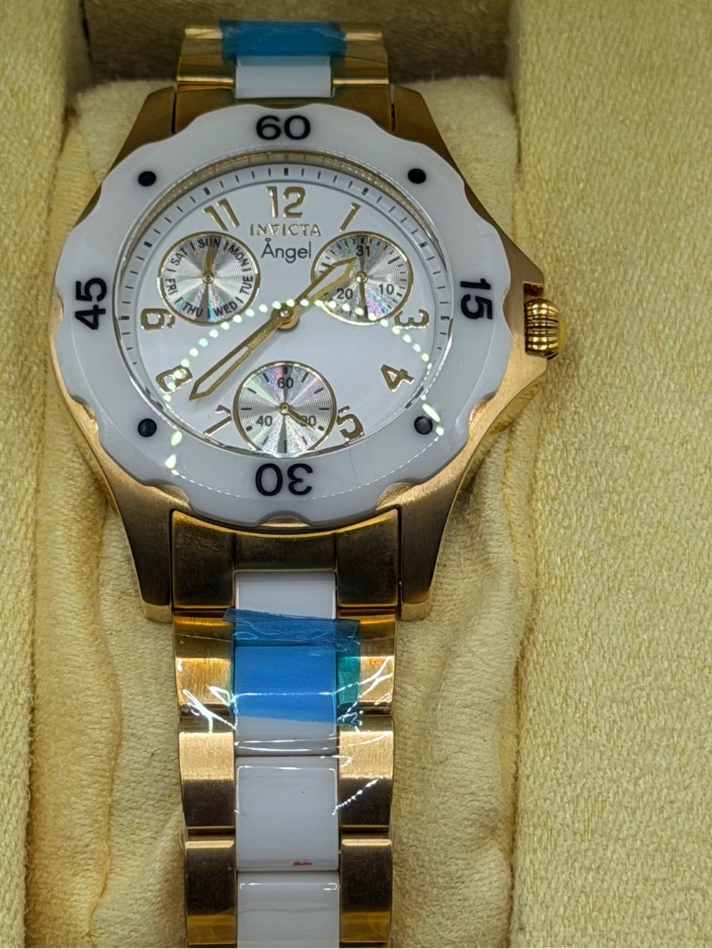Invicta Gold Tone Watch with White & Blue Accents